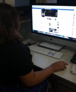 Rosaura Montes, student journalist checks her Facebook profile page.  Photo by: Alicia Edquist